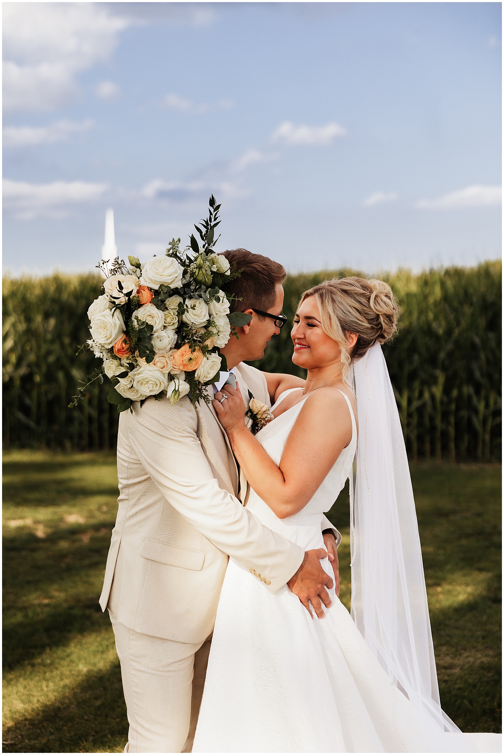 Newlyweds dance on the edge of a cornfield at a sable creek homestead wedding